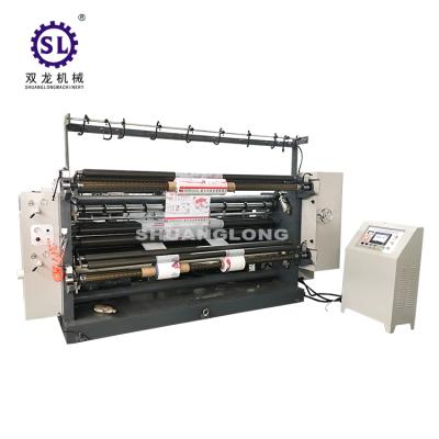 China High Speed ​​CLOTHING PLC Slitting Rewinder Machine for sale