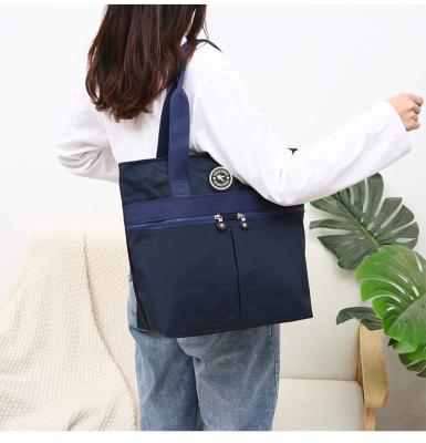 China Hot Selling Eco-friendly Large Capacity Shopping Bag Reusable Nylon Tote Bag For Travel Daily Shopping for sale