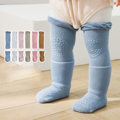 China Solid With Anti Slip Baby Knocks Knee Pads Set Elastic Knee Non Slip Crawling Toddler Silicone Protector Baby Knocks Knee Pads for sale