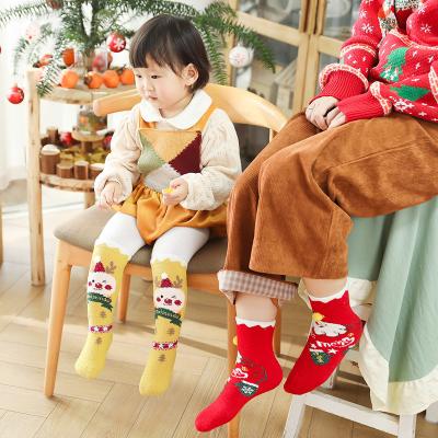 China Christmas Gift Sports Family Socks Coral Velvet Warm Fuzzy Furry Parent-child Socks Anti Slip Cartoon Funny Christmas Socks for sale