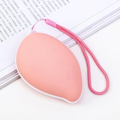 China Fast Charging Support Professional Custom Mango Shape Warmer 3000 Mah Reusable Portable Rechargeable Hand Power Bank for sale