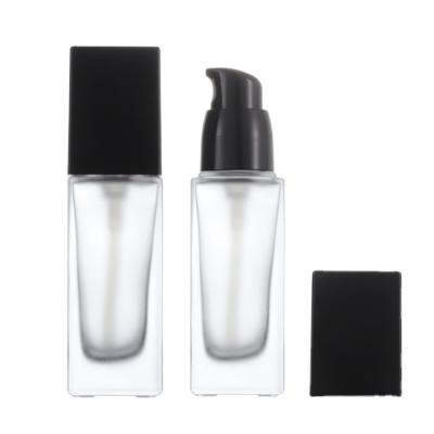 China Factory Price 50ml Viable Foundation Lotion Glass Liquid Bottle With Square Pump for sale