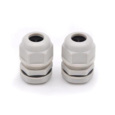 China M12 2-3-4 Soft Outer Hole Cable Gland Hole Cable Seal Nylon Rohs Ip68 Multi Hole Plastic Multi Hole Cable Seal for sale