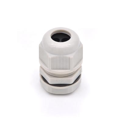 China Soft Surface Manufacturer 4mm Nylon Cable GLAND m20 Four Holes Multi Hole Waterproof Cable Connector for sale