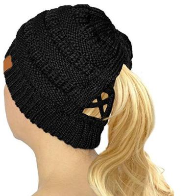 China COMMON Crisscross Ponytail Messy Buns Knit Beanie Winter Cap Stretchy Hat (Solid Purple) for sale