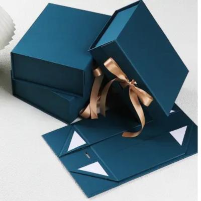 China Modern Luxury Folding Paper Box Gift Keepsake Packaging Luxury Magnetic Gift Boxes With Ribbon for sale