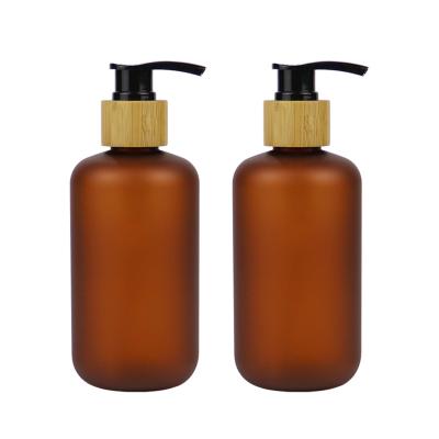 China Non Spill 50ml 100ml 150ml Empty Boston Round Cylinder Cosmetic Amber PET Plastic Bottle for sale