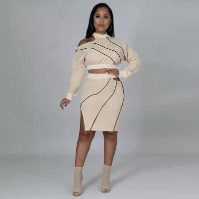 China Sustainable 2022 Women Contrast Tilt Shoulder Cut Out Long Sleeve Crop Top And Skirt Set for sale