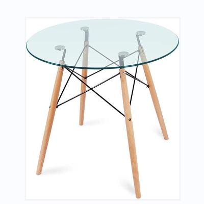 China Nordic Hot Wooden Clear Side Leg Tempered Glass Table Furniture Dining Room Sale Dining Table For Small Spaces for sale