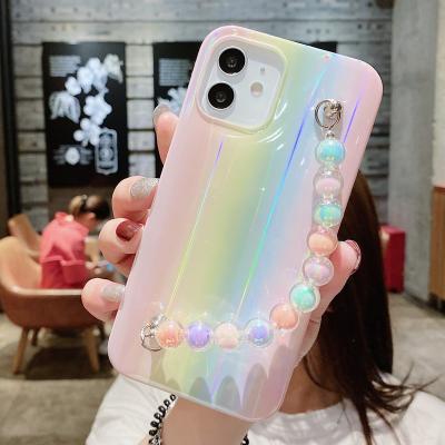 China Luxury shockproof designer phone case with pearl, young people's favorite, European and American trends, gifts for sale