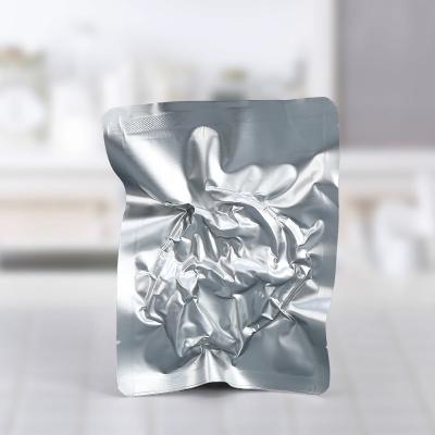 China Opaque Silver Foil Food Vacuum Mylar Bag Recyclable Laminated Composite Vacuum Sealer Bags for sale