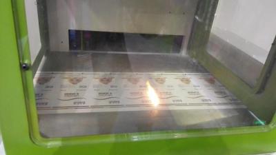 China Laser Die Cut Machine , Label Laser Cutting Machine for Roll to Roll Sticker for sale