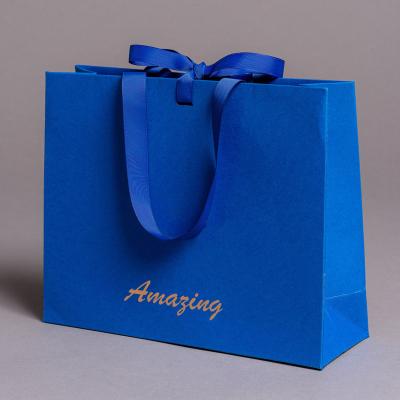 China Recyclable custom luxury Durable Clothes store retail packaging gift carry bags boutique shopping paper bags with your own logo for sale