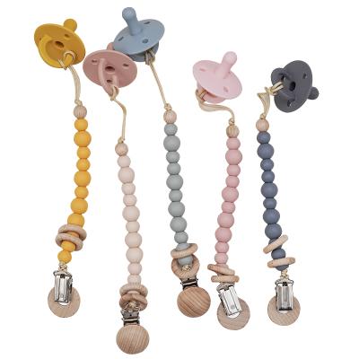 China Eco-freindly 2020 New Arrivals Inventory Baby Teether Weaning Easy To Rinse Silicone Teethers Pacifier Chain Pendant Xmas Tree Shape for sale