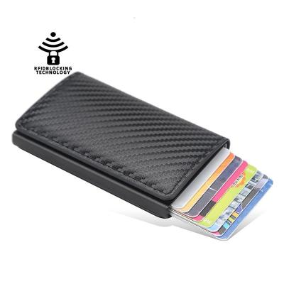 China RFID+Automatic pop-up Carbon fiber pattern men women card holder metal aluminum case automatic cartridge card sleeve RFID minimalist thin wallet for sale