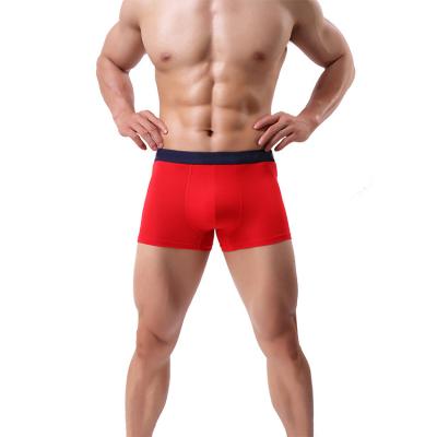 China Seamless Mid-Rise Men's Solid Color Antibacterial Men's Underwear Summer Thin Boxer Briefs for sale