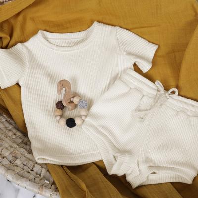 China Hot Sale Kids Cotton Oversized Set Of 100% Cotton T-shirt And Shorts Printing Cotton Baby Suit Organic Newborn Clothes Overalls Split Type for sale