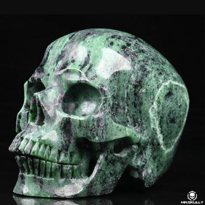 China Wholesale High Quality Africa Ruby Zoisite Crystal Skulls Hand cut Healing Crystal Skulls for sale