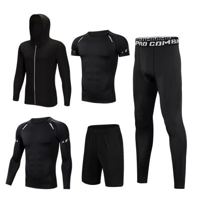 China Breathable Wholesale Training Suits Sweatsuit Men Training&Jogging Wear Type Sportswear Tracksuits for sale