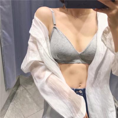 China Antibacterial French border non-steel with eight rows button vest strapless tube top bra without rims cup deep v cotton women bra for sale