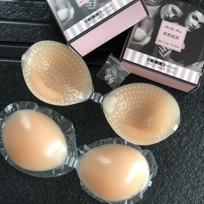 China Pump wedding glue silicone backless strapless bra with massage point thickening pad and invisible straps gather invisible bra for sale