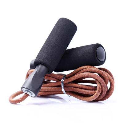 China Durable Foam Handle Adjustable Weighted Training Rope Cowhide Jump Rope Fitness Jump Rope for sale