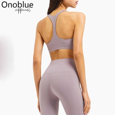 China QUICK DRY 2021 OEM Women Fitness Sports Custom Workout Gym Suits Cross Back Bra Wave Top Leggings Yoga Sets for sale