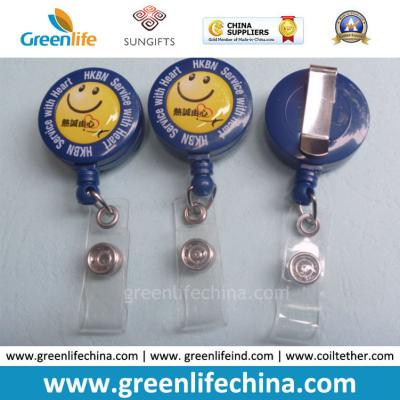 China Simle Face Logo Promotional Retractable Round Plastic Reel Holder for sale