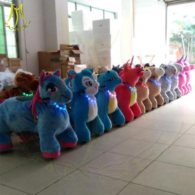 China Hansel kids 4 wheel animal bikes stuffed animal unicorn on wheels kids playground coin operated kiddie rides for rent for sale