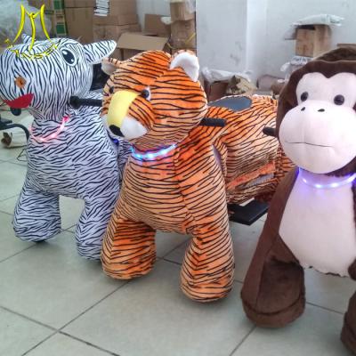 China Hansel Guangzhou plush moving toy animal toy horse on 4 wheels for kids for sale