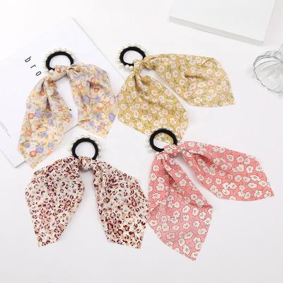 China New Long Elastic Ponytail Holder Bow Ribbon Hair Scarf Floral Printed Scrunchies Bead Decorated Elastic Band Ponytail Holder Hair Accessories for sale