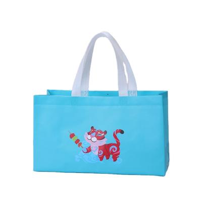 China Wholesale non-woven thickened pp packaging bag environmental protection shopping bag cartoon printing advertising small gift packaging folding for sale