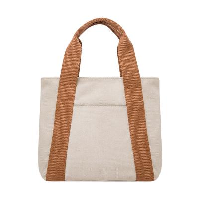 China New Power Saver Women's Fashionable Large Capacity Hand Roll Bag Tote Bag Bento Bag Solid Color Casual Canvas for sale