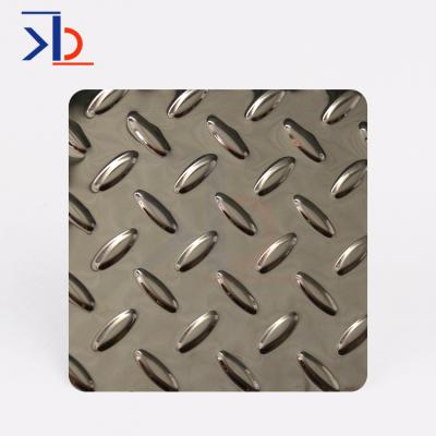 China Decoration wall panel color stainless steel plate stamped 3d crisscross oval patterned stainless steel sheet for hotel decoration for sale