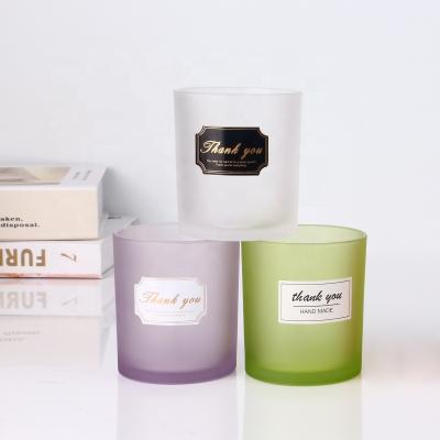 China Home Decoration Color Candle Wholesale Spray Frosted Glass Jars For Candle Making for sale