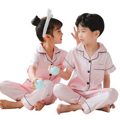 China Thermal Solid Pajamas Printing Satin Kids Short Sleeve and Pants Suit for Girl and Boy Children Sleepwear for sale