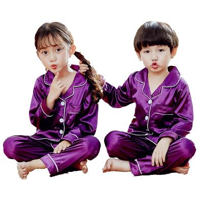 China Kids Thermal Solid Silk Pajamas Satin Ice Sleepwear Kids Long Sleeve Sets Suit For Girl And Boy Pajamas for sale