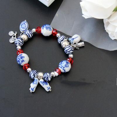 China Romantic Red Crystal Blue And White Hand Painted Porcelain Forever Bracelet Beaded Jewelry for sale