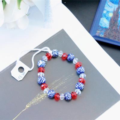 China Cute kids red crystal jewelry beaded bracelets for kids for young lady natural ceramic jewelry for sale