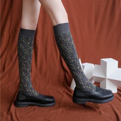 China Cheap wholesale sporty women flower long tube thongs floral knee high socks for women for sale