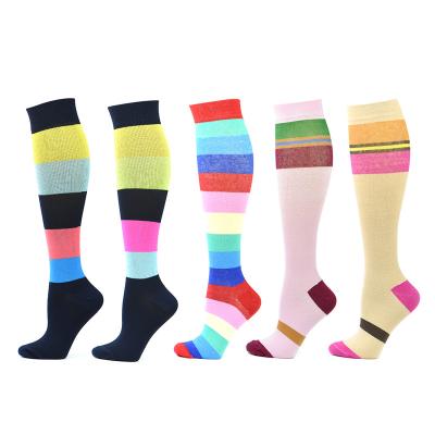 China Anti-slip Private Label 8-15 mmHg High Quality Compression Boots Women's Fancy Design Multi Colored Patterned Knee High Socks for sale