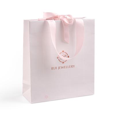 China Wholesale Recyclable Recyclable Custom Printed Wedding Cheap White Pink Paper Gift Packaging Bags With Your Own Logo for sale