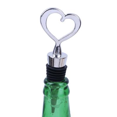 China Heart Shaped Beer Champagne Cork Wedding Favors Gifts Metal Red Wine Bottle Vacuum Stopper Twist Heart Shape Gifts for sale