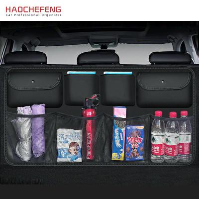 China Brief & HAOCHEFNEG Color Simple Multi-pocket Car Trunk Storage Organizer Auto Hanging Backseat Heavy Duty Foldable Trunk Organizer with Net Pocket for sale