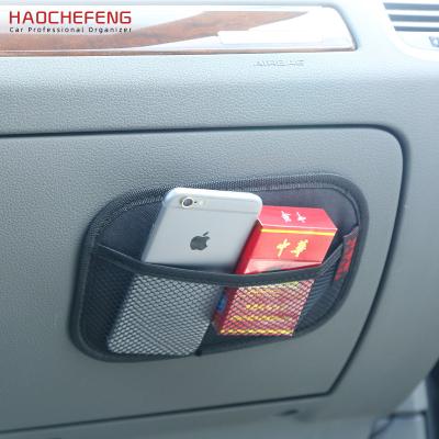 China HAOCHEFENG Driver Car Side Net Pocket Clutter Eco-friendly Phone Holder Strong Paste Organizer for sale