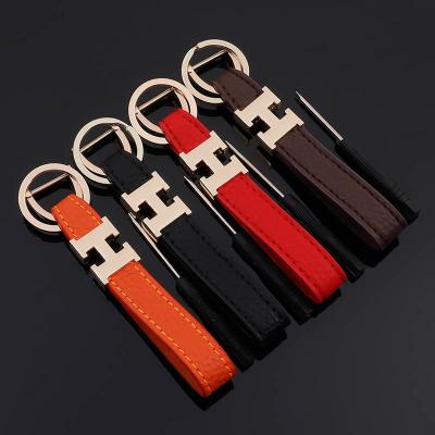 China Leather Zinc Alloy Fashoinal Factory Haochefeng Factory Metal Key Chain Car Interior Key Holder for sale