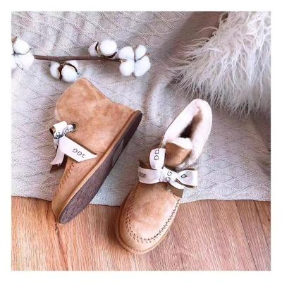 China Fashion Trend Wholesale Ladies Bows Shoes Women Winter Snow Genuine Leather Ankle Boots For Women for sale