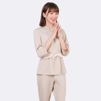 China Modern beauty uniform comfortable simple atmosphere beige top pants set leisure beauty salon uniform for sale