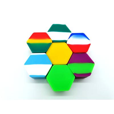 China 7ml Hexagon Mix Color Stocked Silicone Dabs Container Wax Jar For HBO Oil for sale