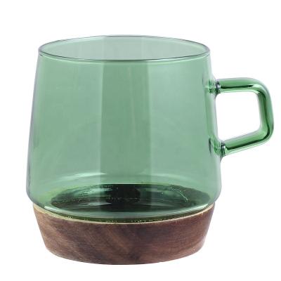 China Sustainable 350ml Solid Color Borosilicate Glass Mug With Wooden Base For Tea Coffee for sale